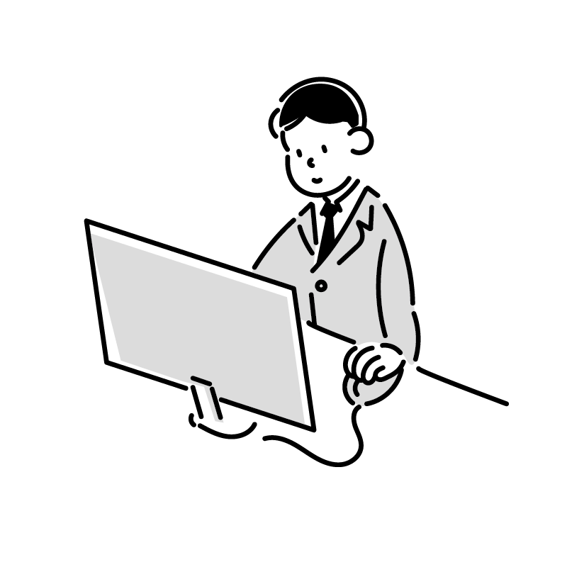 男性がパソコンを操作している画像